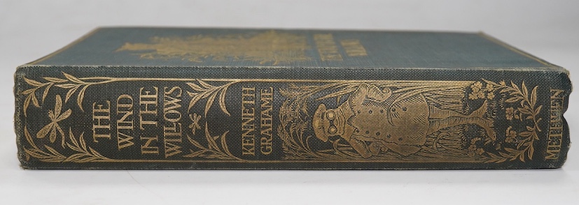 Grahame, Kenneth - The Wind in the Willows ... First Edition. frontispiece (by Graham Robertson) and tissue guard, half title; original gilt ruled and pictorial cloth, gilt top with other edges rough trimmed. Methuen and